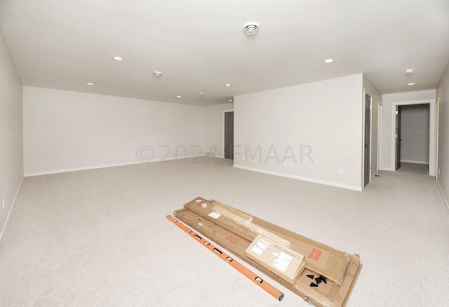 basement featuring carpet flooring