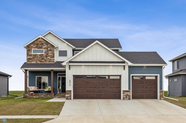 craftsman-style house with driveway, stone siding, board and batten siding, an attached garage, and a shingled roof