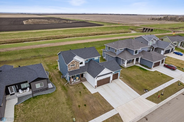 bird's eye view featuring a rural view and a residential view