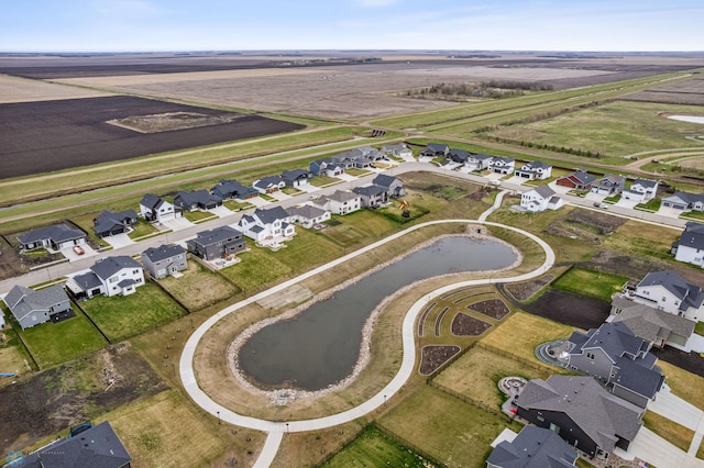 aerial view with a residential view and a water view