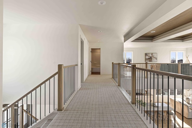 hallway featuring an upstairs landing