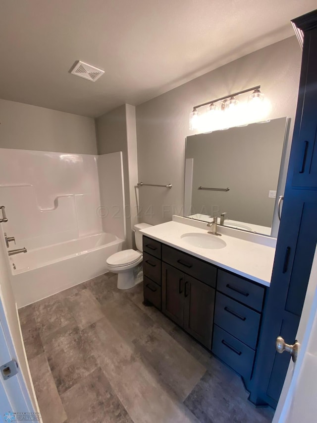 full bathroom with vanity, shower / bathtub combination, and toilet