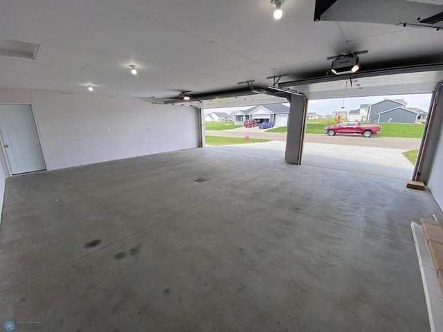 1316 Southview Dr SW, Glyndon, MN 56547 - garage featuring a garage door opener