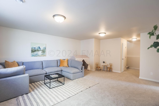 living room featuring light colored carpet