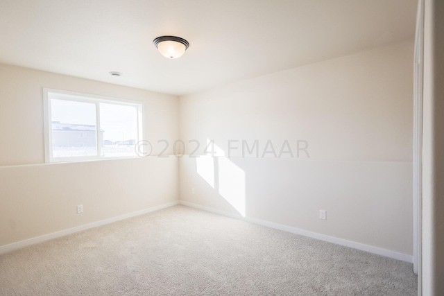 view of carpeted spare room