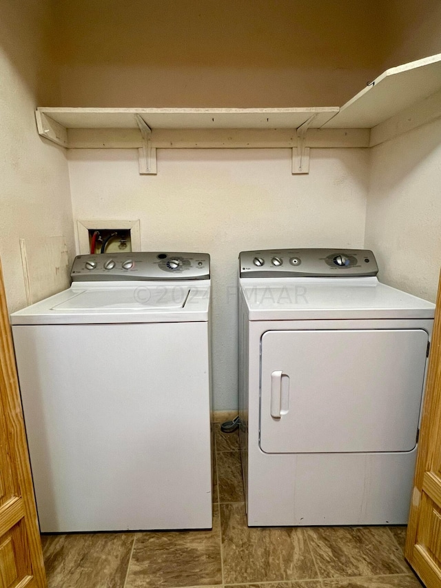 laundry room featuring laundry area and independent washer and dryer