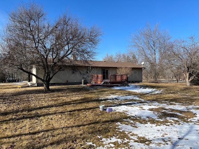 view of front of property with a wooden deck