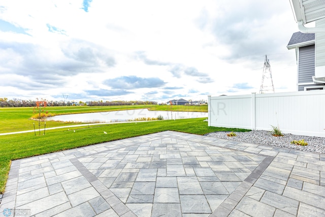 view of terrace featuring a water view