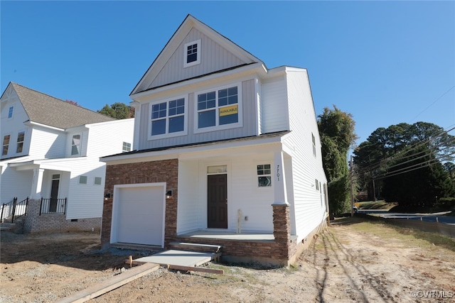 view of front of property featuring a garage