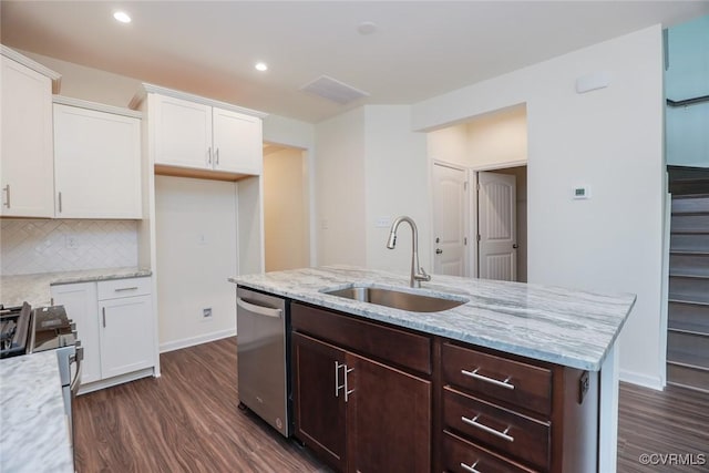 kitchen with white cabinetry, sink, dark hardwood / wood-style floors, and appliances with stainless steel finishes