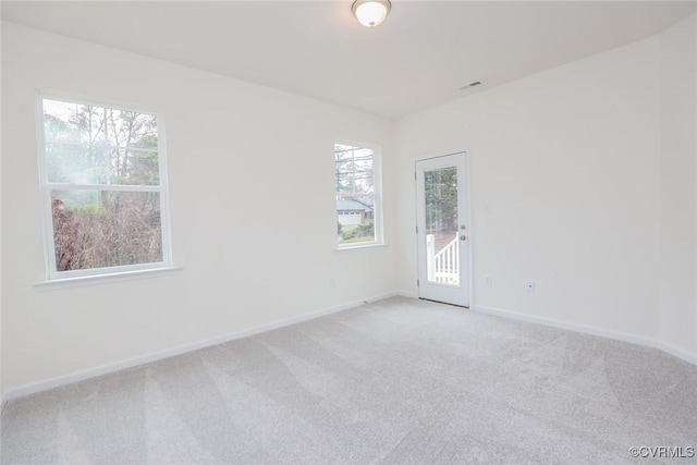 view of carpeted spare room