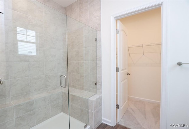 bathroom featuring walk in shower