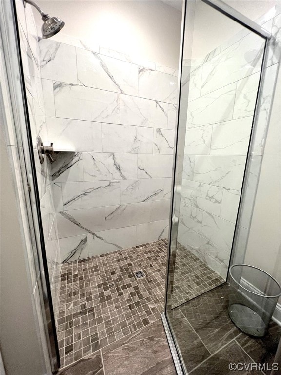 bathroom with a stall shower