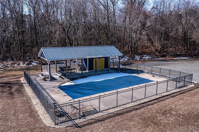 view of pool featuring a patio area, fence, and a fenced in pool