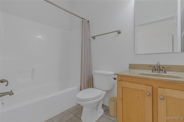 bathroom featuring vanity, shower / bath combination with curtain, toilet, and tile patterned floors