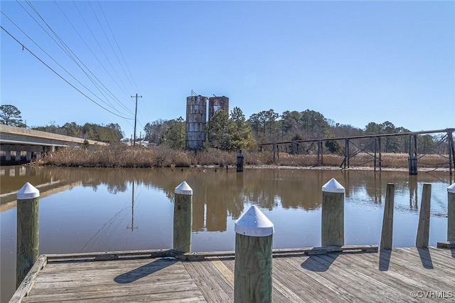 view of dock with a water view