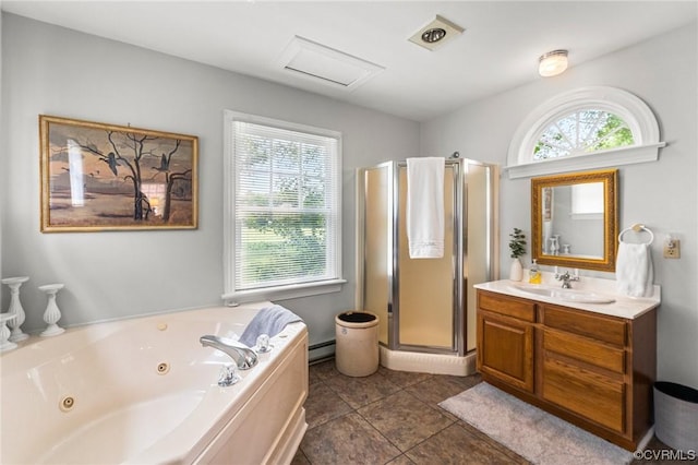 bathroom with tile patterned floors, a jetted tub, a shower stall, baseboard heating, and vanity