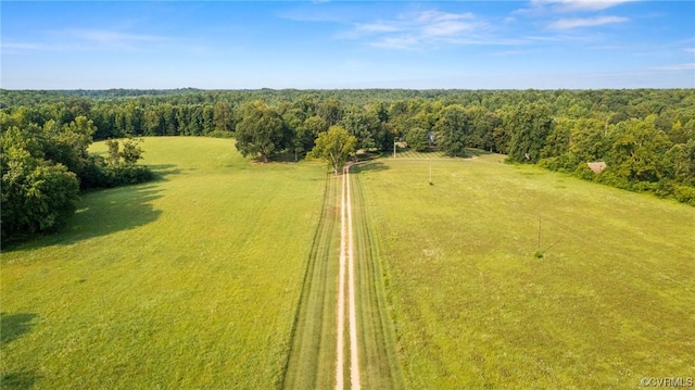 bird's eye view featuring a view of trees