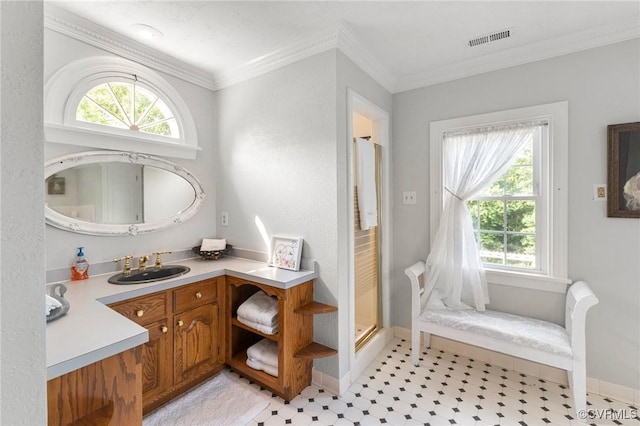 full bathroom with vanity, crown molding, visible vents, and a stall shower