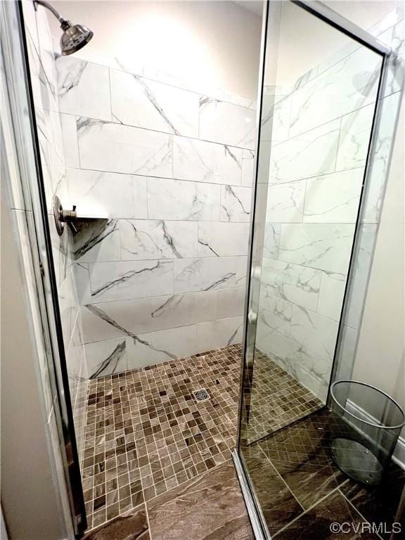 bathroom featuring a stall shower