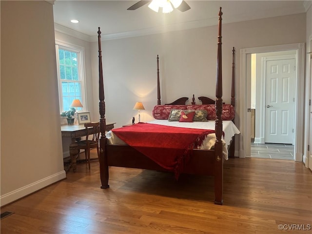 bedroom featuring baseboards, a ceiling fan, ornamental molding, wood finished floors, and recessed lighting