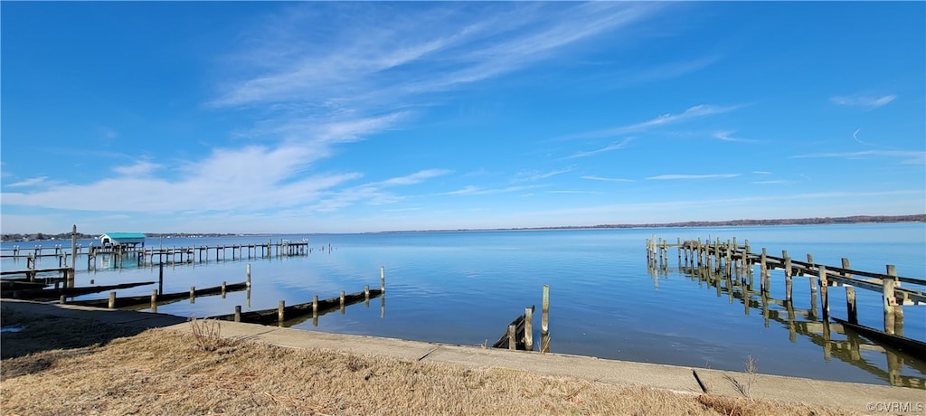 dock area featuring a water view