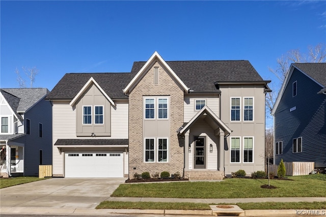 view of front of home with a front yard and a garage