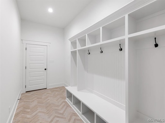 mudroom with light parquet flooring