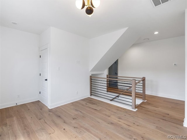 bonus room featuring light hardwood / wood-style flooring