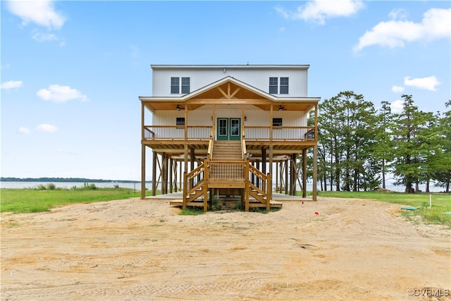 view of front of house featuring a water view and covered porch