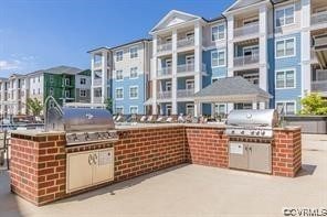 view of patio / terrace featuring area for grilling and an outdoor kitchen