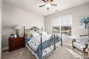 bedroom with ceiling fan and light colored carpet