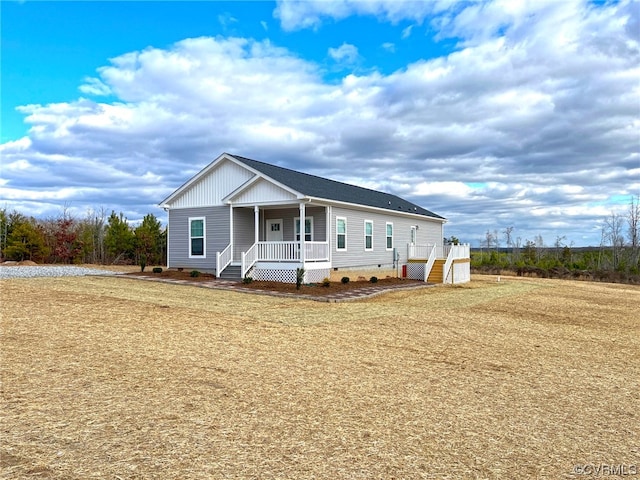 view of front of property featuring covered porch