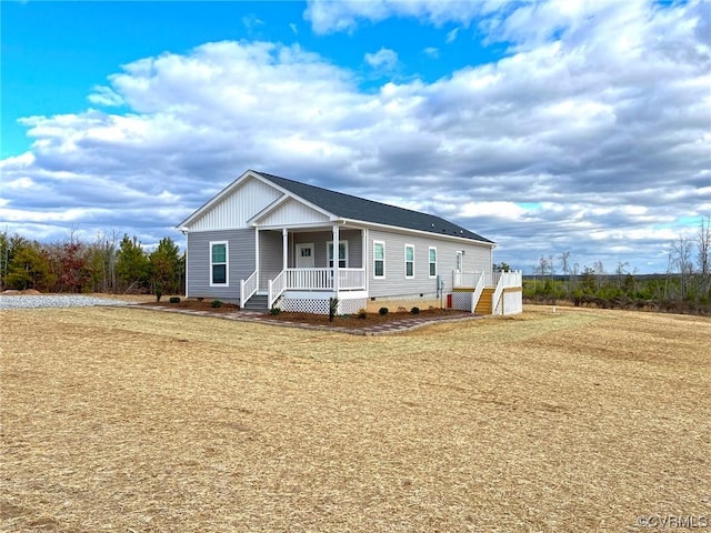 view of front of property with crawl space and a porch