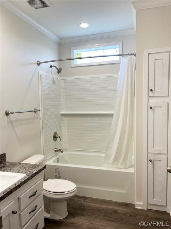 bathroom featuring visible vents, crown molding, toilet, shower / tub combo, and wood finished floors