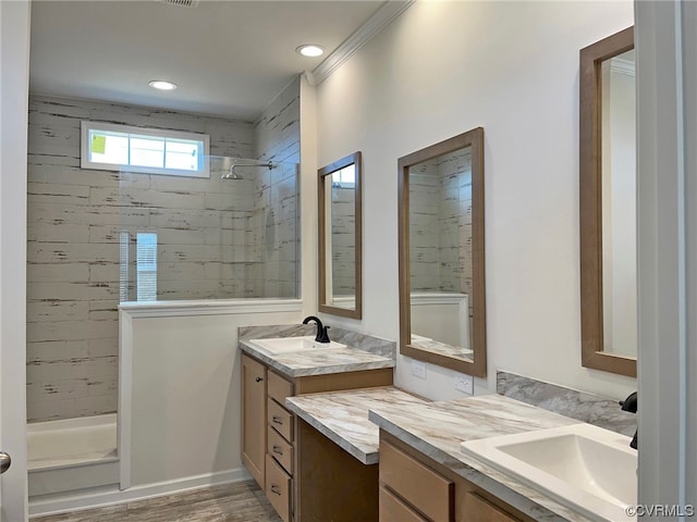 bathroom featuring vanity and wood-type flooring