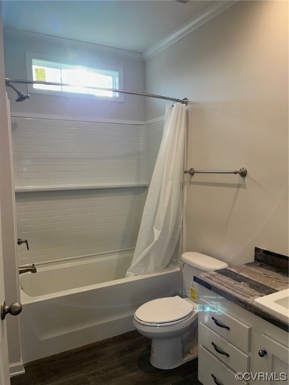 full bathroom featuring wood-type flooring, shower / bath combo with shower curtain, vanity, crown molding, and toilet