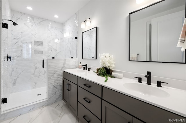 bathroom with tile floors, dual bowl vanity, and a shower with door