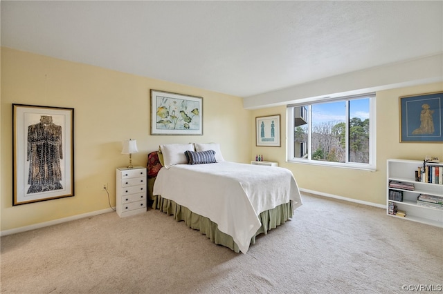 bedroom with light colored carpet