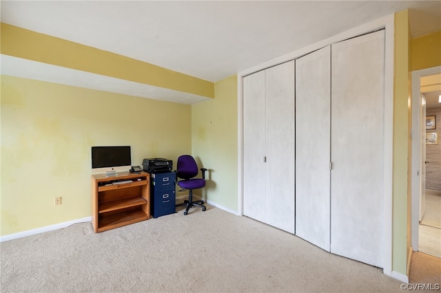 office area featuring light colored carpet