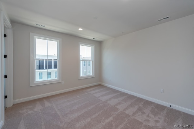 view of carpeted spare room