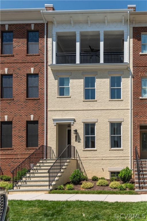 exterior space featuring a balcony