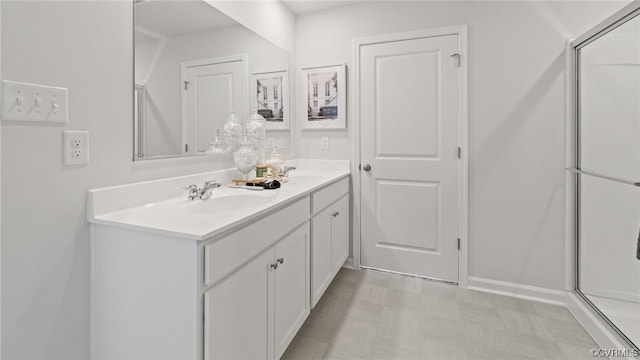 bathroom with vanity and walk in shower