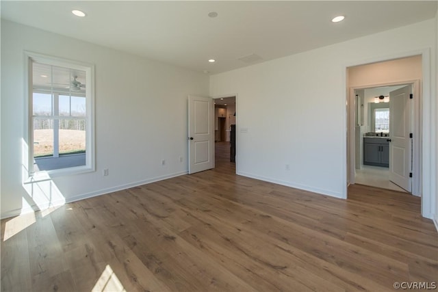 empty room featuring hardwood / wood-style flooring