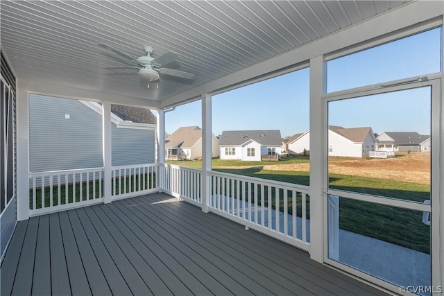 unfurnished sunroom featuring wood ceiling