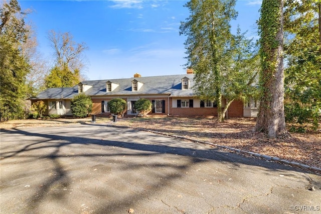 view of new england style home