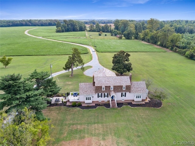 birds eye view of property featuring a rural view