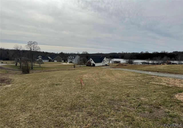 view of yard with a water view