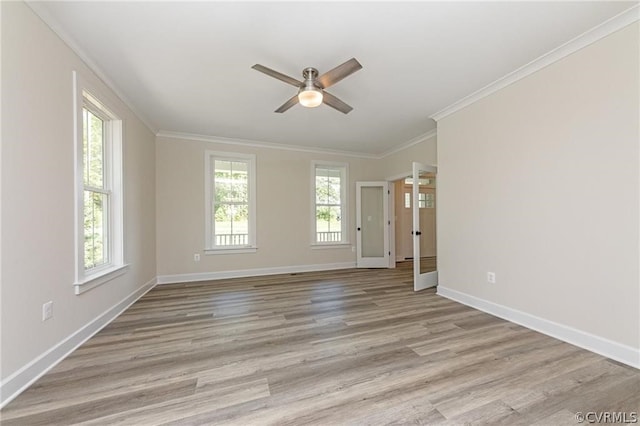 unfurnished room with plenty of natural light, ceiling fan, light hardwood / wood-style flooring, and crown molding