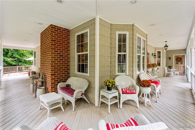 wooden terrace featuring a porch